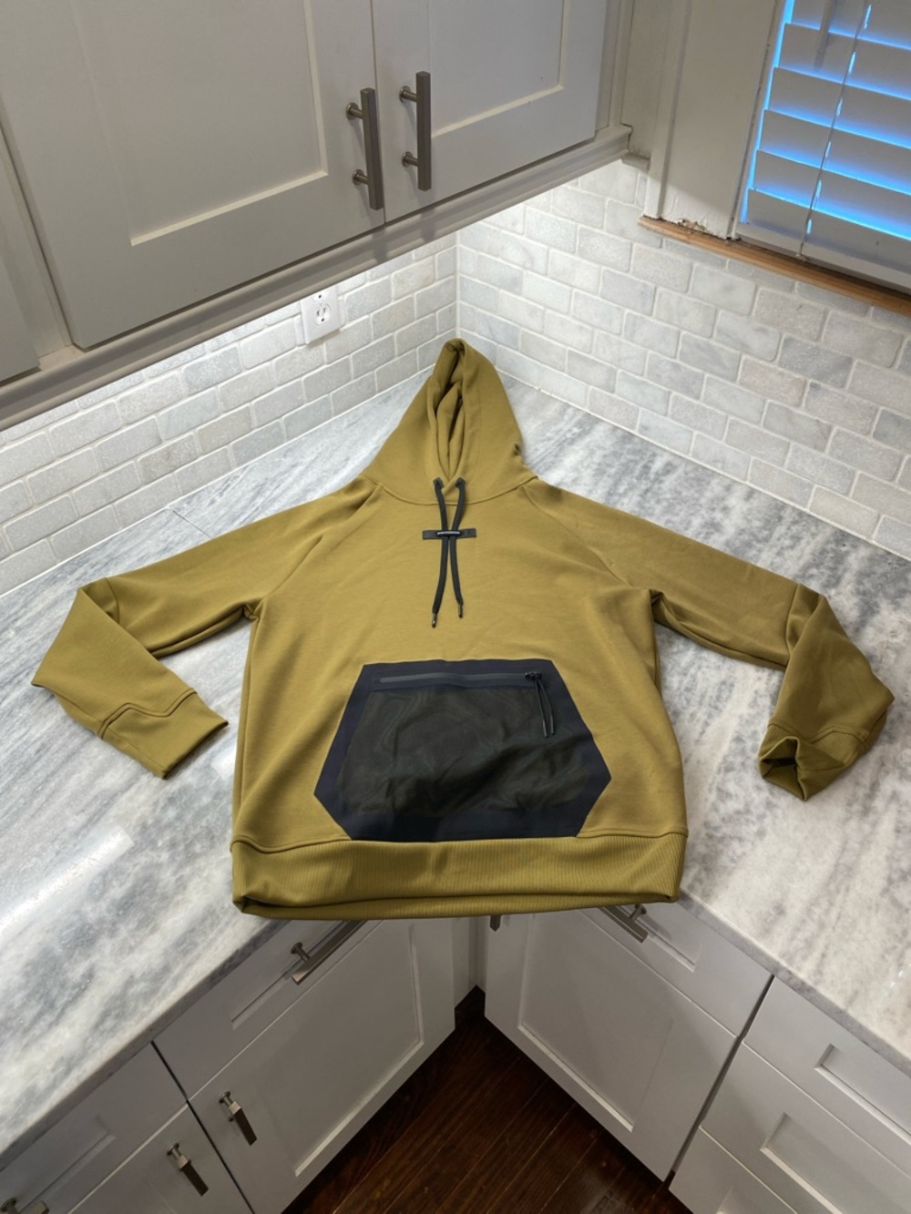 On Running Olive Green Hoodie with Black Liner. New without tags.
